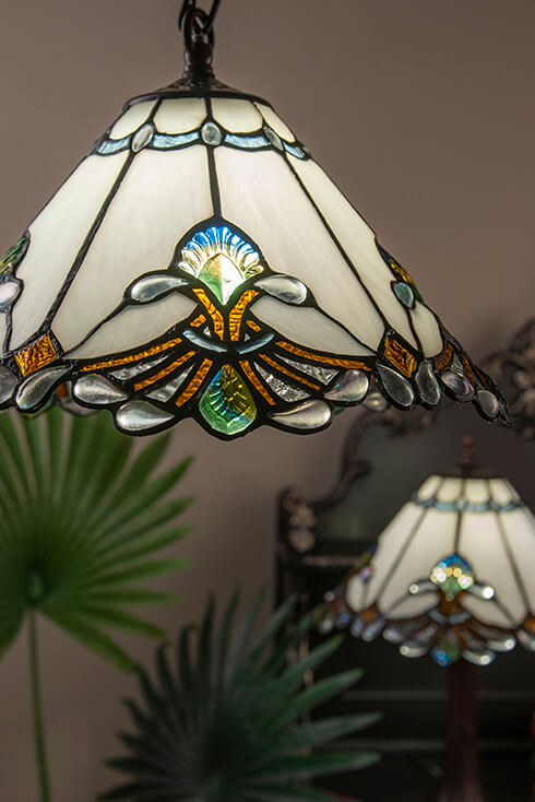 A detailed Tiffany pendant light with a vintage look