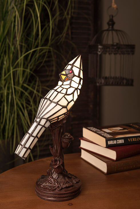 A white bird Tiffany table lamp