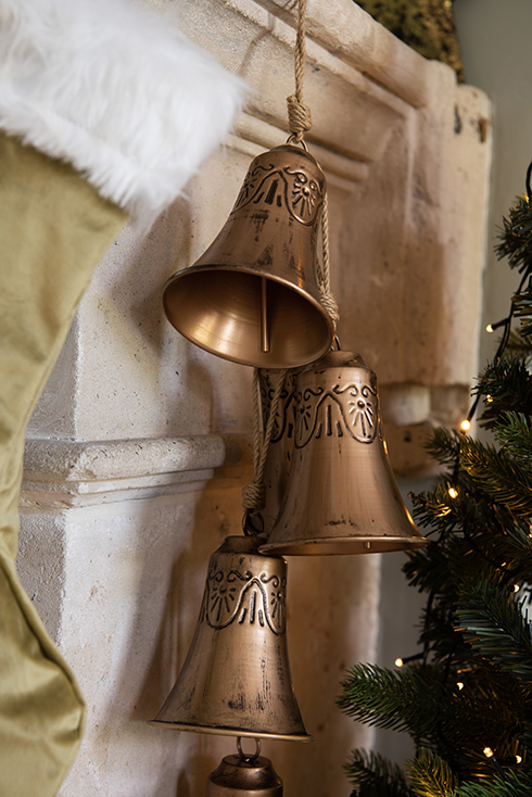 A collection of copper-colored bells