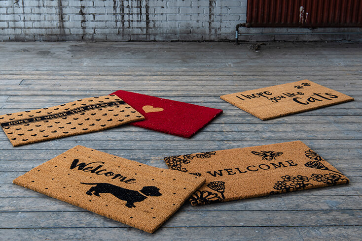 A collection of doormats with cute designs